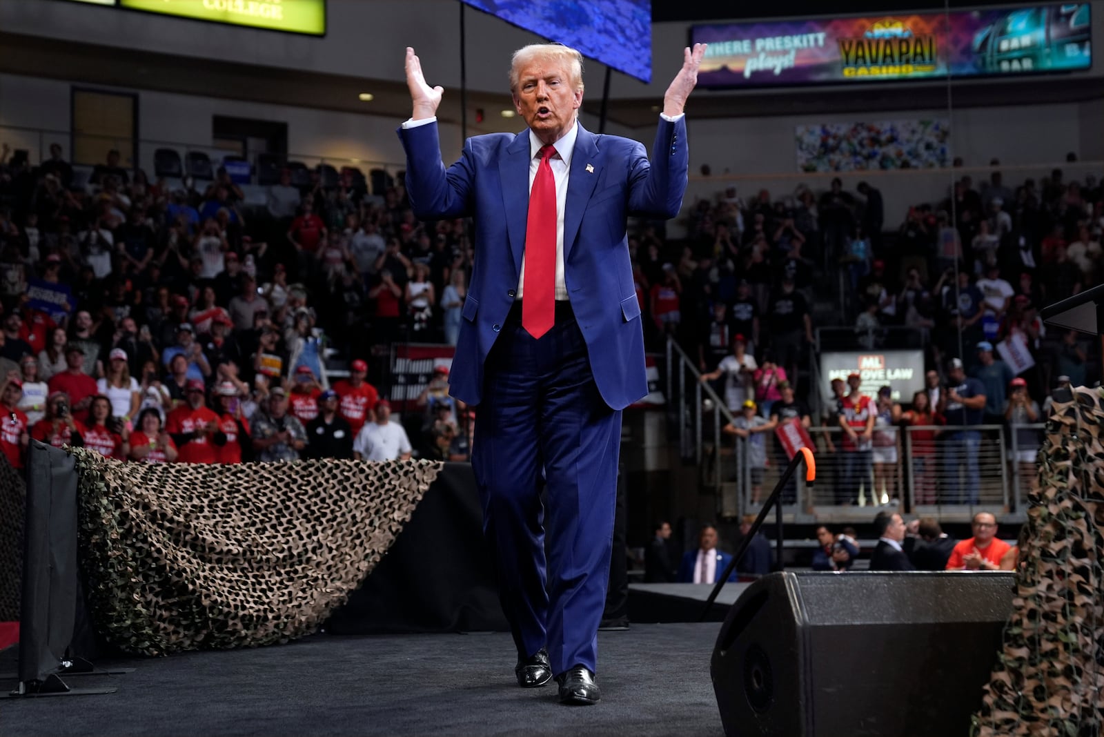 Republican presidential nominee former President Donald Trump gestures at a campaign rally at the Findlay Toyota Arena Sunday, Oct. 13, 2024, in Prescott Valley, Ariz. (AP Photo/Evan Vucci)