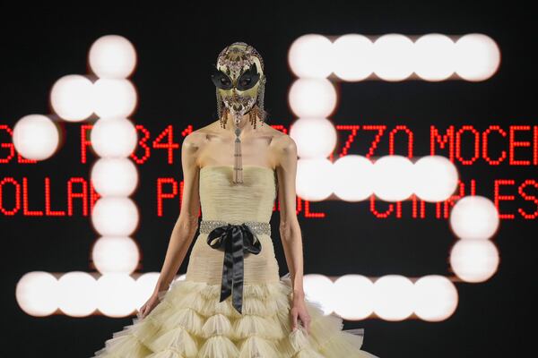 A model wears a creation as part of the Valentino Haute Couture Spring Summer 2025 collection, that was presented in Paris, Wednesday, Jan. 29, 2025. (AP Photo/Lewis Joly).