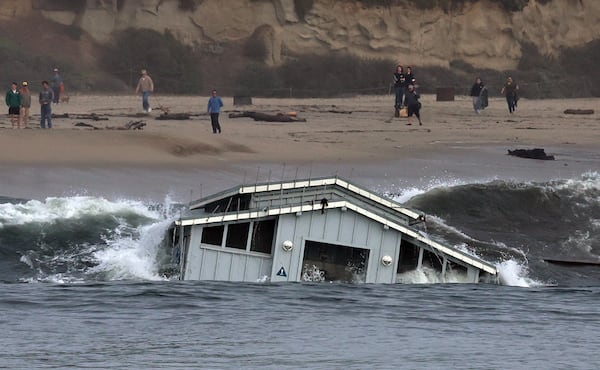 A building from a wharf collapse floats in the ocean Monday, Dec. 23, 2024, in Santa Cruz, Calif. (Shmuel Thaler/The Santa Cruz Sentinel via AP)