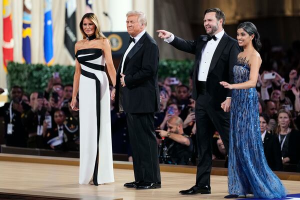 From left, first lady Melania Trump, President Donald Trump, Vice President JD Vance and second lady Usha Vance attend the Commander in Chief Ball, part of the 60th Presidential Inauguration, Monday, Jan. 20, 2025, in Washington. (AP Photo/Ben Curtis)