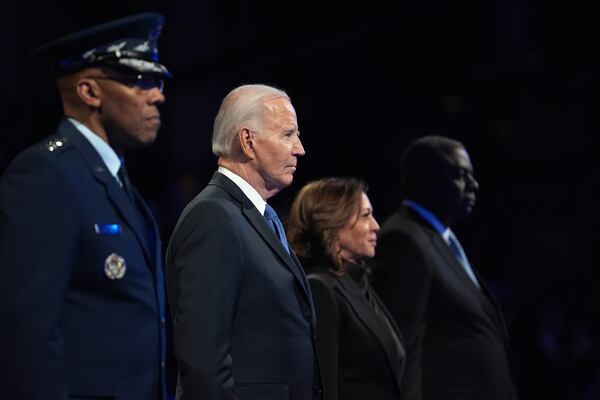 Chairman of the Joint Chiefs of Staff Gen. CQ Brown, from left, President Joe Biden, Vice President Kamala Harris and Defense Secretary Lloyd Austin stand during a Department of Defense Commander in Chief farewell ceremony at Joint Base Myer-Henderson Hall, Thursday, Jan. 16, 2025, in Arlington, Va. (AP Photo/Evan Vucci)