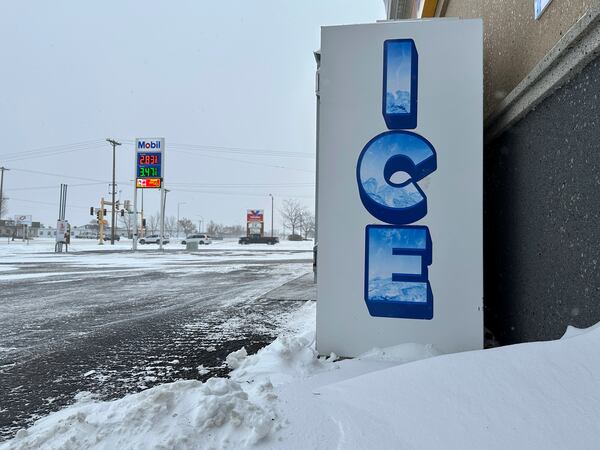 A convenience store's ice storage is a sign of the times on a blustery winter day in Bismarck, N.D., on Thursday, Dec. 19, 2024. (AP Photo/Jack Dura)