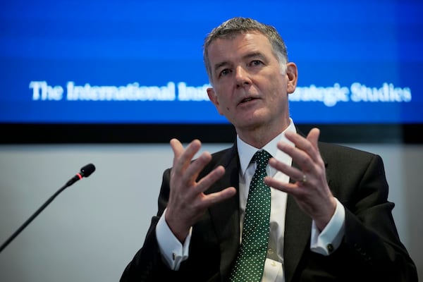 FILE - Richard Moore, the Chief of Britain's Secret Intelligence Service, also known as MI6, answers questions at the International Institute for Strategic Studies, in London, on Nov. 30, 2021. (AP Photo/Matt Dunham, File)