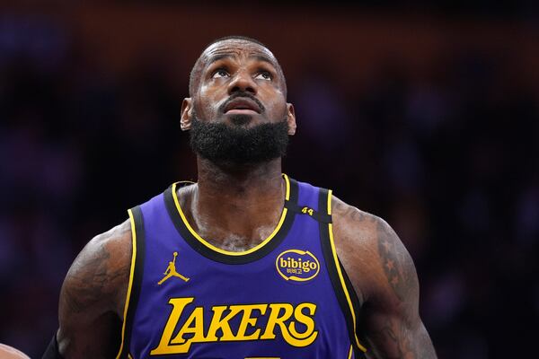 Los Angeles Lakers forward LeBron James waits for a rebound during the second half of an NBA basketball game against the Atlanta Hawks, Friday, Jan. 3, 2025, in Los Angeles. (AP Photo/Mark J. Terrill)