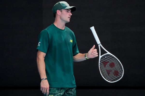 Tommy Paul of the U.S. reacts during a fourth round match against Alejandro Davidovich Fokina of Spain at the Australian Open tennis championship in Melbourne, Australia, Sunday, Jan. 19, 2025. (AP Photo/Vincent Thian)