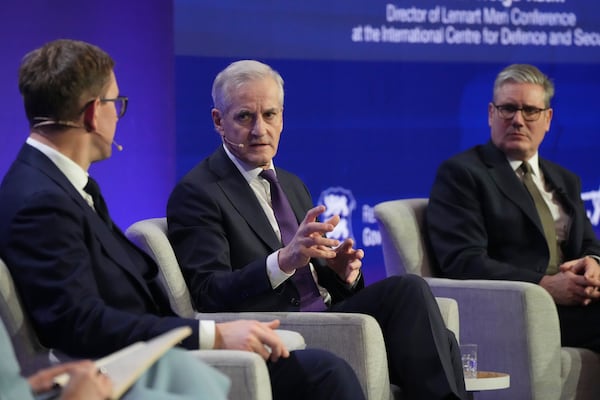 FILE - From left, Estonian Prime Minister Kristen Michal, Norwegian Prime Minister Jonas Gahr Store and British Prime Minister Keir Starmer attend a public discussion during the Joint Expeditionary Force Leaders' Summit in Tallinn, Estonia, on Dec. 16, 2024. (AP Photo/Sergei Grits, File)