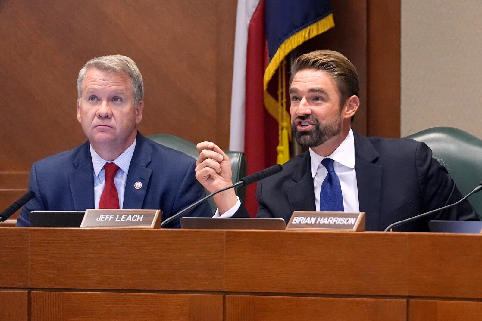 Texas Rep. Jeff Leach, R-Plano, right, poses a question to a witness as Rep. David Cook, R-Mansfield, left, listens during a committee hearing regarding the death row case of Robert Roberson, Monday, Oct. 21, 2024, in Austin, Texas. (AP Photo/Tony Gutierrez)