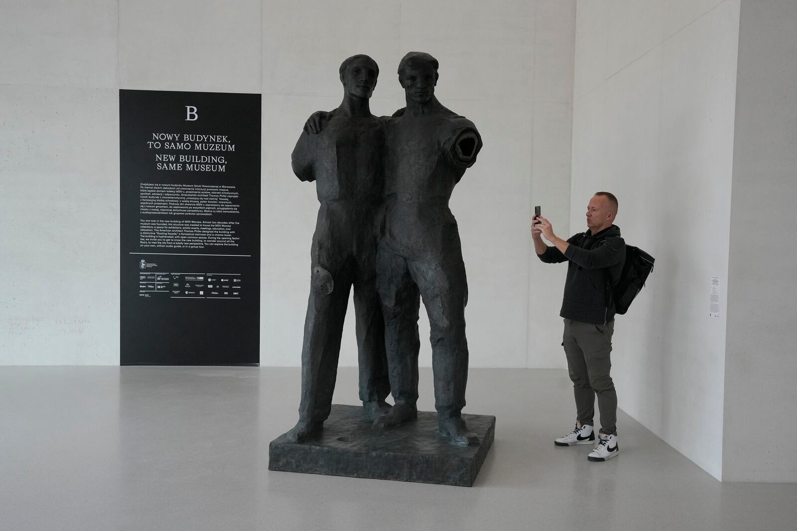 A man photographs a sculpture in the Museum of Modern Art in Warsaw, Poland, on Thursday Oct. 24, 2024. (AP Photo/Czarek Sokolowski)