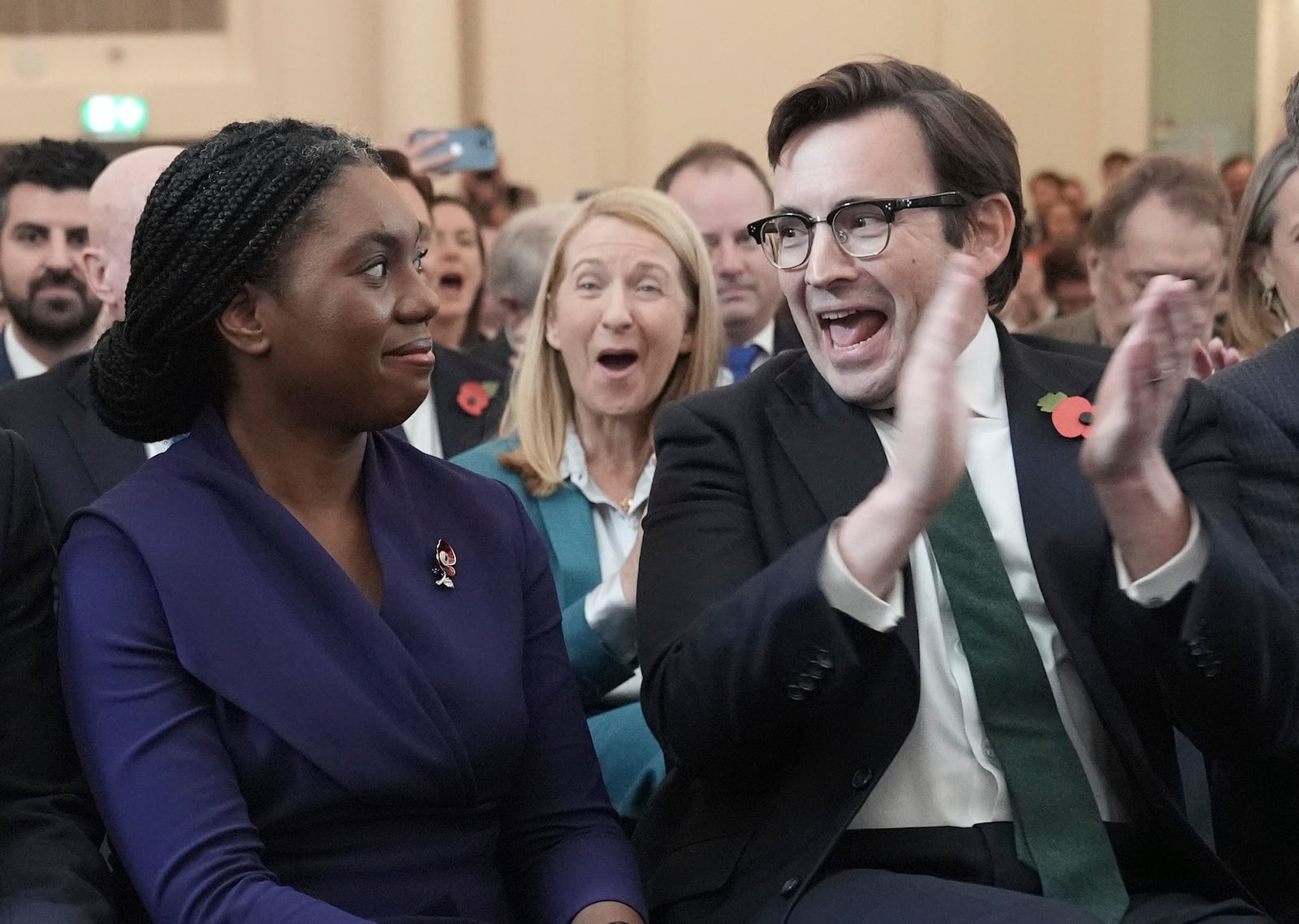 Britain's Member of Parliament Kemi Badenoch's husband Hamish applauds as she was announced as the new Conservative Party leader following the vote by party members, at 8 Northumberland Avenue in central London, Saturday Nov. 2, 2024. (Stefan Rousseau/PA via AP)