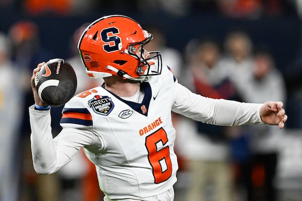 Syracuse quarterback Kyle McCord (6) passes during the first half of the Holiday Bowl NCAA college football game against Washington State Friday, Dec. 27, 2024, in San Diego. (AP Photo/Denis Poroy)