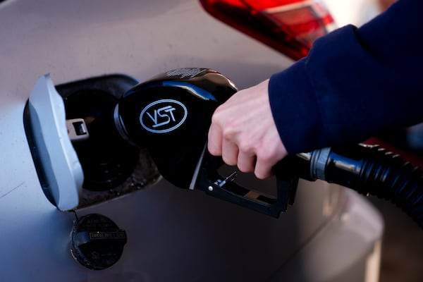 FILE - A driver fills up at a gasoline pump at a Shell gas station, Oct. 9, 2024, in Seattle. (AP Photo/Lindsey Wasson, File)