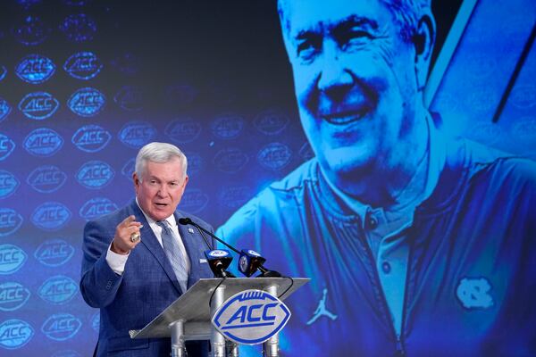 FILE - North Carolina head coach Mack Brown speaks during the Atlantic Coast Conference NCAA college football media days in Charlotte, N.C., Thursday, July 18, 2019. (AP Photo/Chuck Burton, File)