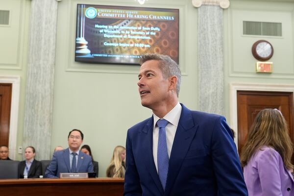 Former Wisconsin Rep. Sean Duffy, R-Wis., arrives to testify before the Senate Commerce, Science, and Transportation Committee on Capitol Hill in Washington, Wednesday, Jan. 15, 2025, for his nomination to be Transportation Secretary. (AP Photo/Susan Walsh)