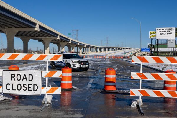 The entrance to the Hwy 146 Seabrook Kemah bridge over Clear Lake is closed Wednesday, Jan. 22, 2025 following severe winter storms Tuesday. (Kirk Sides/Houston Chronicle via AP)