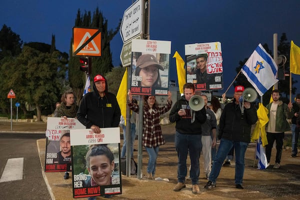 FILE - Israelis seeking the release of hostages in the Gaza Strip demonstrate outside the prime minister's office in Jerusalem on Jan. 5, 2025 (AP Photo/Ohad Zwigenberg, File)