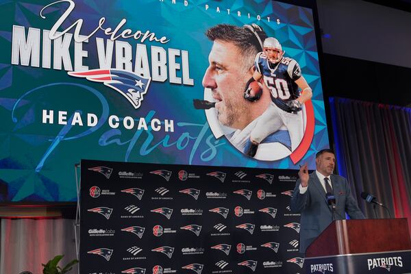 New England Patriots head coach Mike Vrabel gestures during an availability, Monday, Jan. 13, 2025, in Foxborough, Mass. (AP Photo/Charles Krupa)