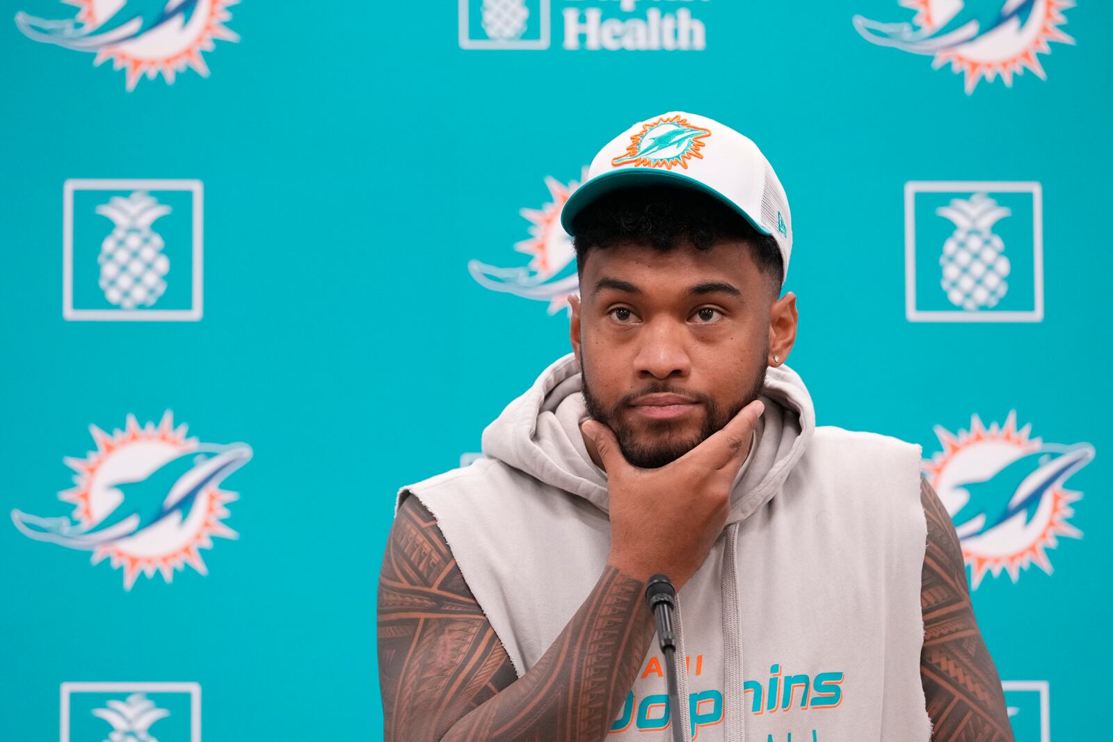 Miami Dolphins quarterback Tua Tagovailoa takes questions during a news conference, Monday, Oct. 21, 2024, at the Dolphins training facility in Miami Gardens, Fla. (AP Photo/Wilfredo Lee)