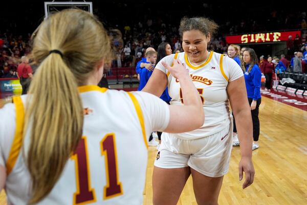 Iowa State center Audi Crooks, right, celebrates with teammate guard Emily Ryan (11) after an NCAA college basketball game against Drake, Sunday, Nov. 24, 2024, in Ames, Iowa. (AP Photo/Charlie Neibergall)