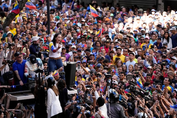 Opposition leader Maria Corina Machado addresses supporters during a protest against Venezuelan President Nicolas Maduro the day before his inauguration for a third term in Caracas, Venezuela, Thursday, Jan. 9, 2025. (AP Photo/Matias Delacroix)