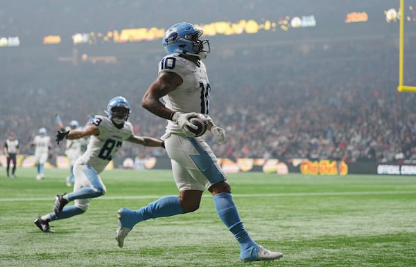 Toronto Argonauts' Kevin Mital (10) scores a touchdown against the Winnipeg Blue Bombers during the second half of a CFL football game at the 111th Grey Cup in Vancouver, British Columbia, Sunday, Nov. 17, 2024. (Darryl Dyck/The Canadian Press via AP)