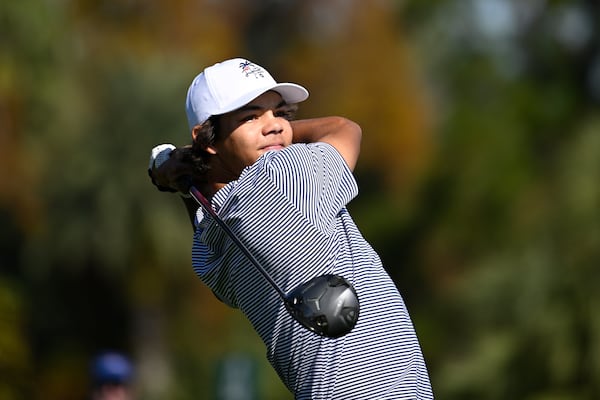 Charlie Woods tees off on the fifth hole during the first round of the PNC Championship golf tournament, Saturday, Dec. 21, 2024 in Orlando. (AP Photo/Phelan M. Ebenhack)