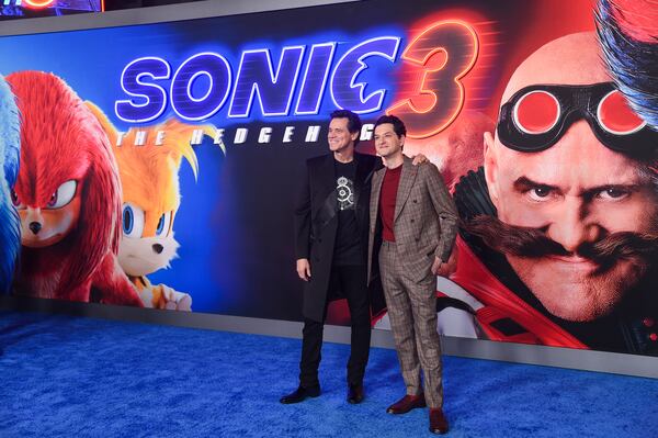 Jim Carrey, left, and Ben Shwartz arrive at the premiere of "Sonic The Hedgehog 3" on Monday, Dec. 16, 2024, at TCL Chinese Theatre in Los Angeles. (Photo by Richard Shotwell/Invision/AP)