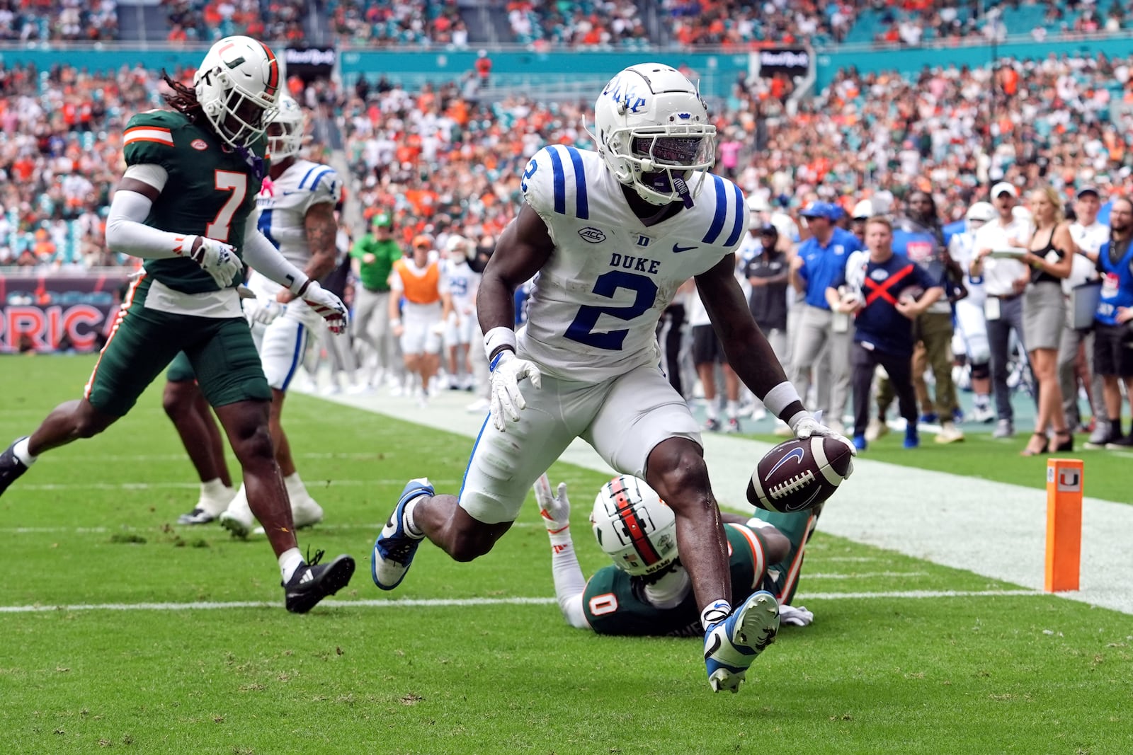 Duke wide receiver Sahmir Hagans (2) runs to score a touchdown during the first half of an NCAA college football game against Miami, Saturday, Nov. 2, 2024, in Miami Gardens, Fla. (AP Photo/Lynne Sladky)