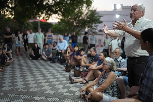 Rogelio Goiburu, the director of the Memory and Reparation Office in Paraguay's Justice Ministry, speaks during a meeting to prepare for Democracy Day celebrations, at Missing Square in Asuncion, Paraguay, Wednesday, Jan. 15, 2025. Goiburu's father, an opponent of the Stroessner dictatorship, went missing in 1977. (AP Photo/Jorge Saenz)