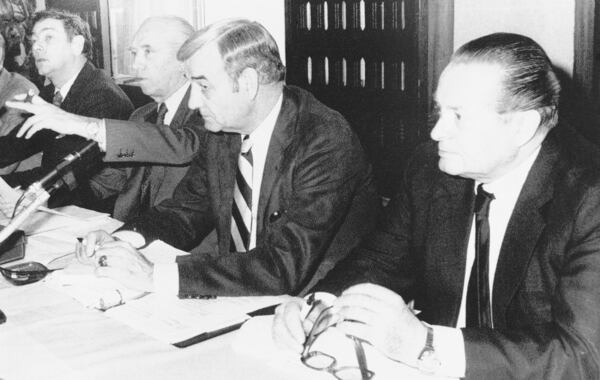 FILE - From left, Belgian representative to the International Olympic Committee (IOC), Prince Alexandre de Merode, President of the Belgian Olympic Committee Raoul Mollet, General Secretary of the U.S. Olympic Committee Col. F. Don Miller, and President of the West German Olympic Committee Willi Daume, are seen during a meeting of officials from 18 Western European Olympic committees to discuss a possible boycott of the MOscow Olympic games on March 22, 1980, in Brussels. (AP Photo/Pierre Thielemans, File)