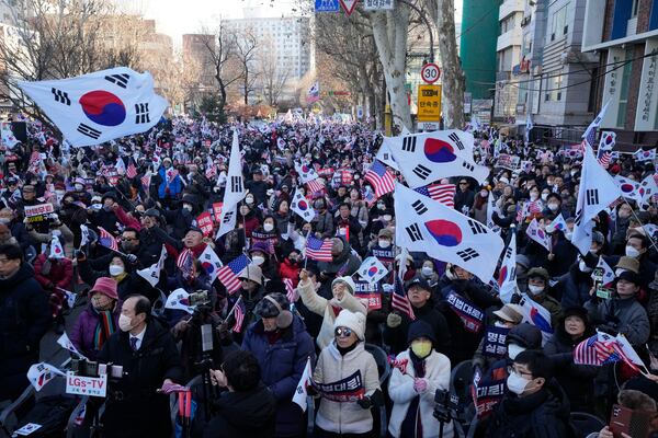 Supporters of impeached South Korean President Yoon Suk Yeol stage a rally to oppose his impeachment near the Constitutional Court in Seoul, South Korea, Thursday, Jan. 23, 2025. (AP Photo/Ahn Young-joon)