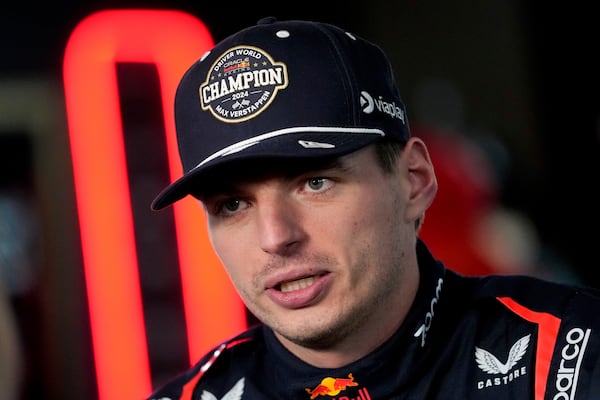 Red Bull driver Max Verstappen, of the Netherlands, conducts an interview after the F1 Las Vegas Grand Prix auto race, Sunday, Nov. 24, 2024, in Las Vegas. (AP Photo/Matt York)