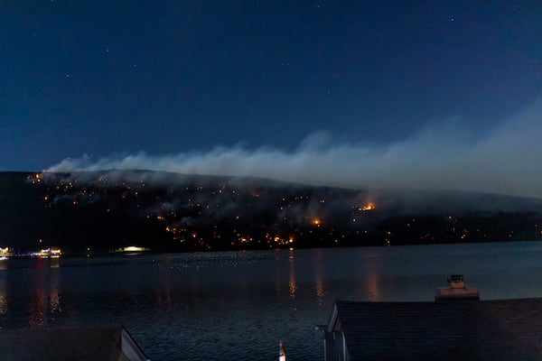 Wildfires burn along the New York and New Jersey border in Greenwood Lake, New York, Wednesday, Nov. 13, 2024. (AP Photo/Eduardo Munoz Alvarez)