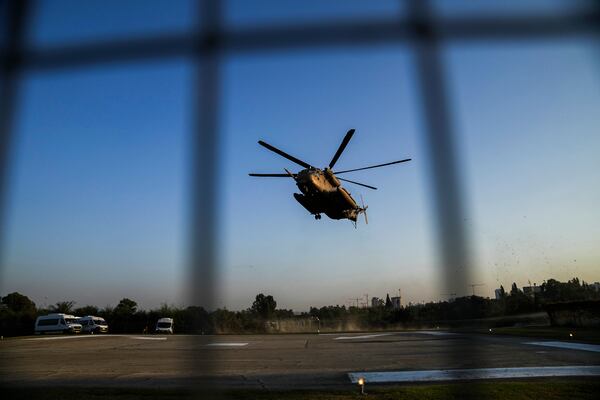 An Israeli military helicopter carrying five Thai hostages released from Gaza lands at Shamir Medical Center (Assaf Harofeh) in Be'er Ya'akov, Israel, Thursday, Jan. 30, 2025. (AP Photo/Maya Alleruzzo)