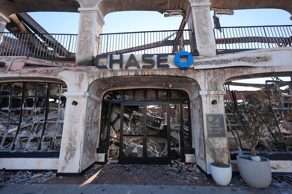 A Chase Bank branch destroyed by the Palisades Fire is seen in the Pacific Palisades neighborhood of Los Angeles, Monday, Jan. 13, 2025. (AP Photo/Richard Vogel)