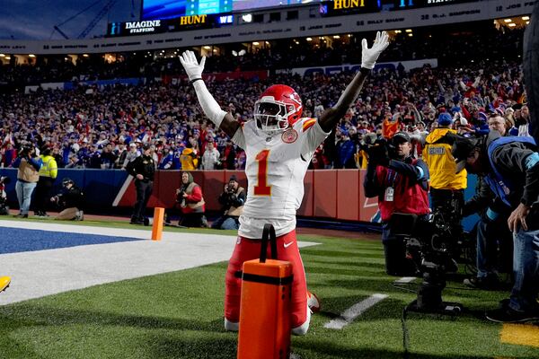 Kansas City Chiefs wide receiver Xavier Worthy (1) celebrates after scoring during the first half of an NFL football game against the Buffalo Bills Sunday, Nov. 17, 2024, in Orchard Park, N.Y. (AP Photo/Julia Demaree Nikhinson)