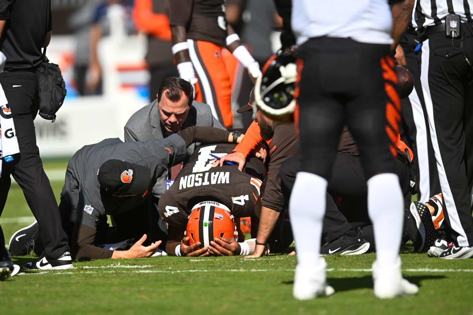 Cleveland Browns quarterback Deshaun Watson (4) reacts after being injured in the first half of an NFL football game against the Cincinnati Bengals, Sunday, Oct. 20, 2024, in Cleveland. (AP Photo/David Richard)