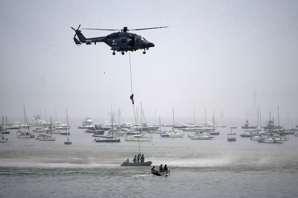 FILE - Indian navy personnel display their skills during Naval Day celebrations in Mumbai, India, Dec. 4, 2024. (AP Photo/Rafiq Maqbool, File)