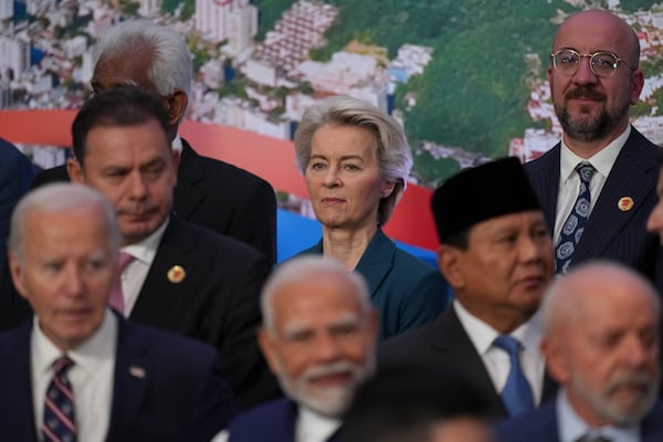 European Commission President Ursula von der Leyen stands with other world leaders as they gather for the G20 Summit group photo, in Rio de Janeiro, Tuesday, Nov. 19, 2024. (AP Photo/Silvia Izquierdo)