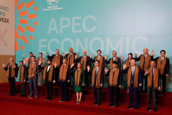 Leaders of the Asia-Pacific Economic Cooperation (APEC) pose for a group photo, in Lima, Peru, Saturday, Nov. 16, 2024. (AP Photo/Fernando Vergara)