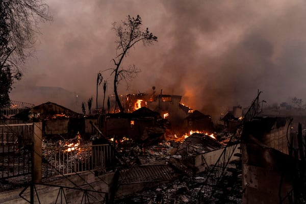 Structures are seen on fire during the Eaton fire in Altadena, Calif., Wednesday, Jan. 8, 2025./San Francisco Chronicle via AP)