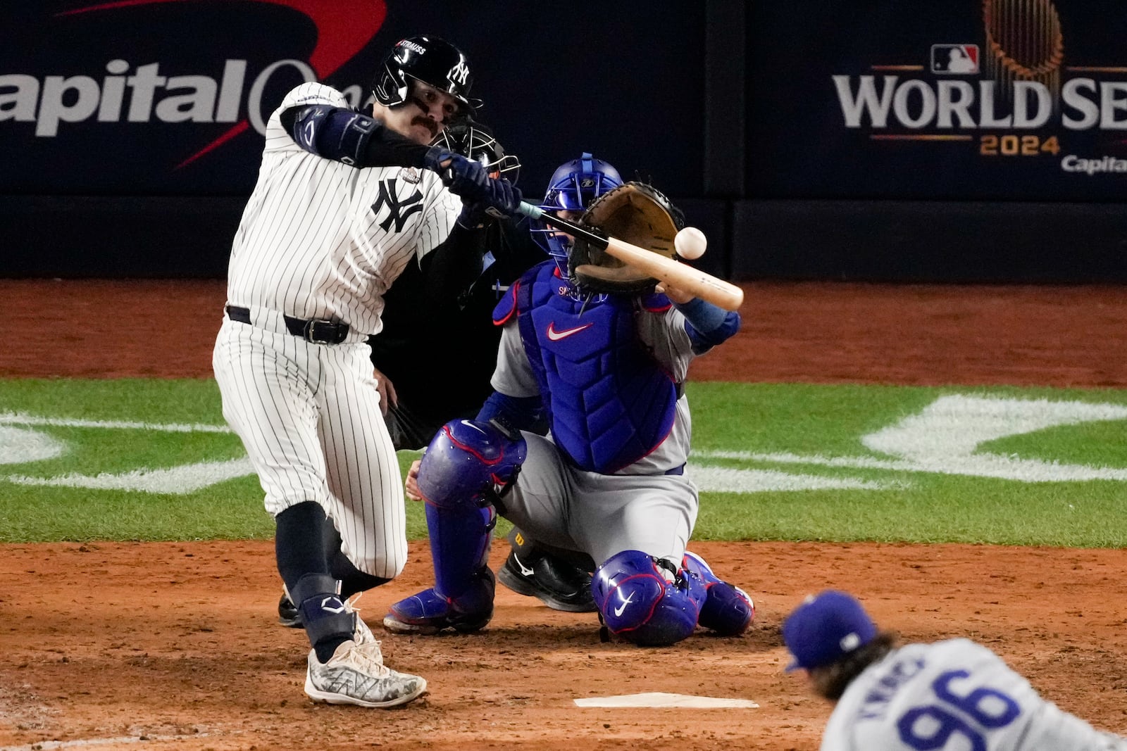 New York Yankees' Austin Wells hits home run against the Los Angeles Dodgers during the sixth inning in Game 4 of the baseball World Series, Tuesday, Oct. 29, 2024, in New York. (AP Photo/Frank Franklin II)