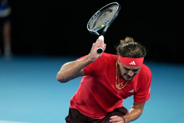 Alexander Zverev of Germany reacts after losing the second set during the men's singles final against Jannik Sinner of Italy at the Australian Open tennis championship in Melbourne, Australia, Sunday, Jan. 26, 2025. (AP Photo/Ng Han Guan)