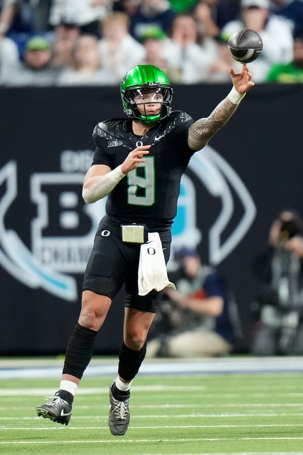 Oregon quarterback Dillon Gabriel throws a pass during the second half of the Big Ten championship NCAA college football game against Penn State, Saturday, Dec. 7, 2024, in Indianapolis. (AP Photo/AJ Mast)