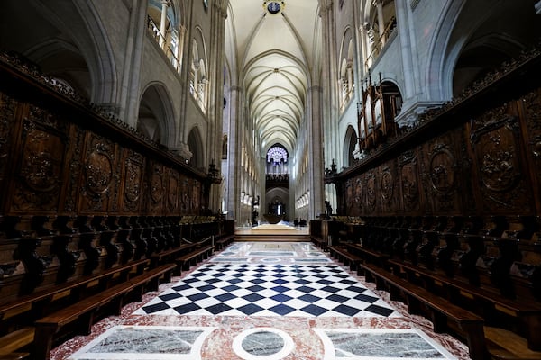 The choir stalls of Notre-Dame de Paris cathedral are seen while French President Emmanuel Macron visits the restored interiors of the monument, Friday Nov. 29, 2024, in Paris. (Stephane de Sakutin, Pool via AP)