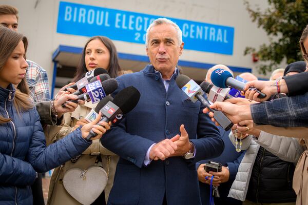 Calin Georgescu, running as an independent candidate for president, speaks to media after registering his bid in the country's presidential elections, in Bucharest, Romania, Tuesday, Oct. 1, 2024. (AP Photo/Alexandru Dobre)