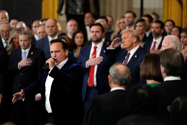 President Donald Trump and Vice President JD Vance listen to Christopher Macchio sing during the 60th Presidential Inauguration in the Rotunda of the U.S. Capitol in Washington, Monday, Jan. 20, 2025. (AP Photo/Julia Demaree Nikhinson, Pool)