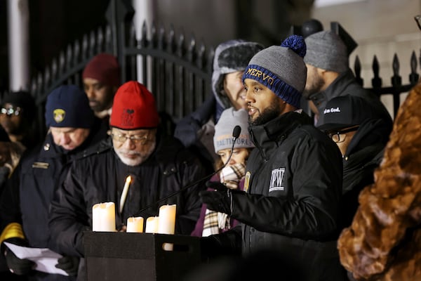 Baltimore Mayor Brandon Scott addresses attendees at the annual Vigil of Remembrance at War Memorial Plaza, Tuesday, Jan. 7, 2025, in Baltimore, Md., to honor the lives of Baltimoreans lost in 2024. (Wesley Lapointe/The Baltimore Banner via AP)