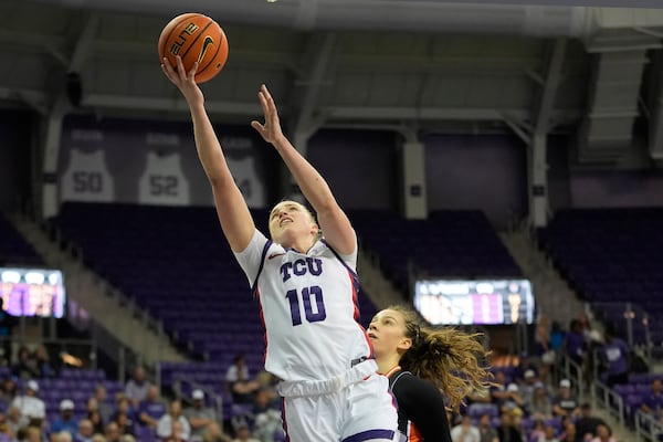 TCU guard Hailey Van Lith (10) shoots against Idaho State guard Maria Dias, right, during the first half of an NCAA college basketball game, Sunday, Nov. 24, 2024, in Fort Worth, Texas. (AP Photo/LM Otero)