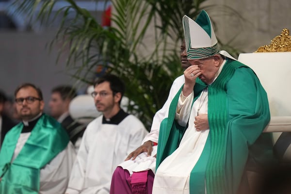 Pope Francis presides over a mass on the occasion of the World Day of the Poor in St. Peter's Basilica, at the Vatican, Sunday, Nov. 17, 2024. (AP Photo/Alessandra Tarantino)