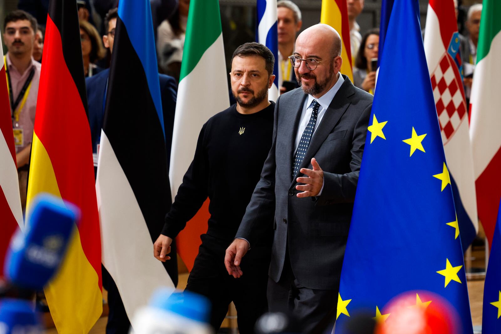 Ukraine's President Volodymyr Zelenskyy, left, and European Council President Charles Michel arrive to an EU summit in Brussels, Thursday, Oct. 17, 2024. (AP Photo/Geert Vanden Wijngaert)